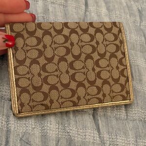 Brown and Gold Patterned Coach Wallet